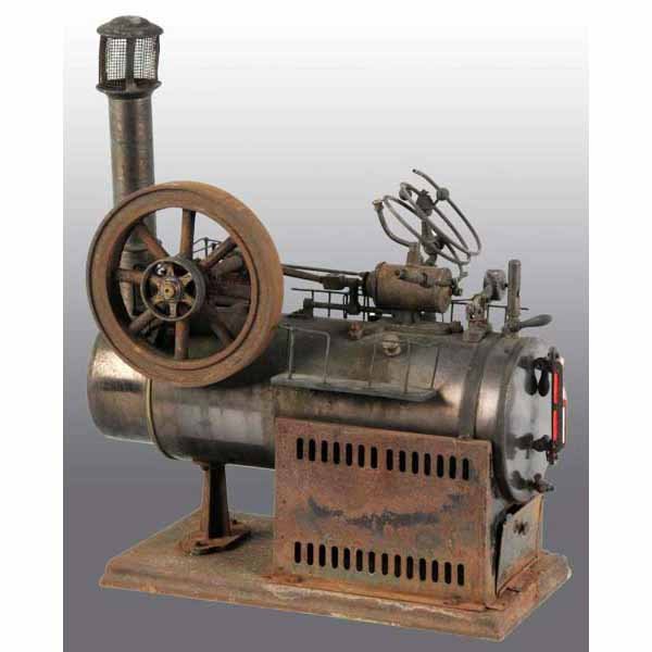 Schoenner No. 107 Overtype Steam Engine.: The picture shows an incorrect steam line that is detached and hung over the governor. The engine has much surface rust. It includes the waterglass, weighted safety, catwalks and original smokestack. 