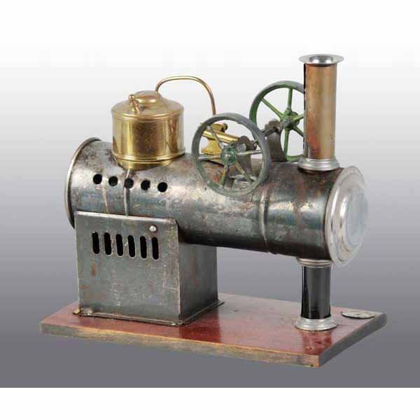 Krauss & Mohr Overtype Steam Engine.: It has a nice name plate attached to the wood base. Double flywheel and with the "steam dome" boiler. Replaced smokestack and some paint loss. 9" x 9 - 1/2".