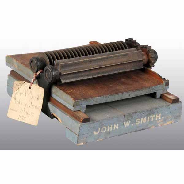 Patent Model of a Meat Tenderizer.: Patented by John W. Smith on February 8, 1876. With its original Patent Office tag. 5 - 1/2" x 12".