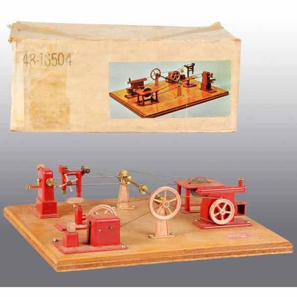 Jensen Steam Toy Accessories on Original Board.: In its original cardboard box with a decal on its side picturing the display board. Accessories included are the trip hammer, drill press, milling machine, circle saw, a plane and a transmission. 14" 