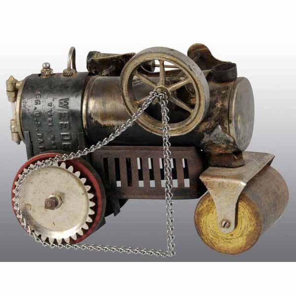 Weeden No. 646 Small Traction Steam Roller.: Includes a waterglass, safety valve, and an oscillsting cylinder. The smokestack is missing and the roller bracket has been re-soldered with a poor job. The drive chain is an incorrect replacement. 7"