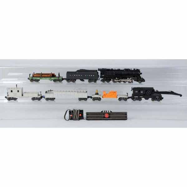 Lionel Post-War O-Gauge No. 2225WS Train.: Includes a 736 Berkshire locomotive with 2046W tender marked "Lionel Lines." A 3620 rotating searchlight car, 3562-25 gray barrel car, 3461X-25 operating lumber car, 6460 black operating crane and 641