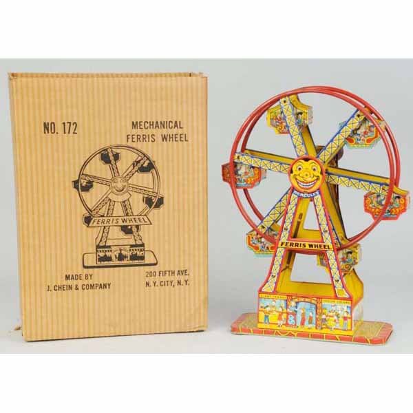 Chein No. 172 Wind-Up Ferris Wheel Toy.: Includes original box. Working. Bell rings. Nice lithography. Crisp box marked "No. 172 Mechanical Ferris Wheel." Dirty base but might clean to a higher grade. 17" T.