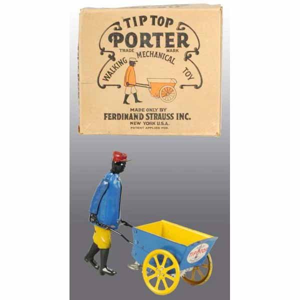 Tin Strauss Tip Top Porter Wind-Up Toy.: American. Working. Beautiful decal on front of toy. Includes scarce original box. 6 - 1/2" L.
