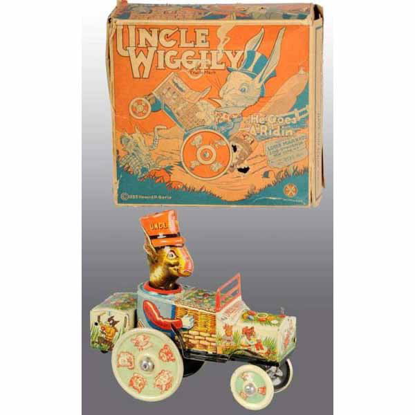 Tin Marx Uncle Wiggly Car Wind-Up Toy.: American. Working. When wound, Uncle Wiggly rolls forward and spins head around. Beautiful lithography on toy is nice, shiny, and bright. Includes very colorful original box marked "Howard R. Garis".