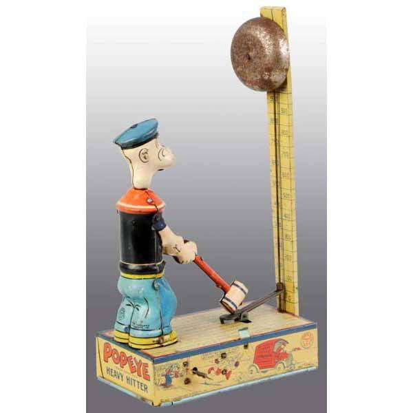Tin Litho Chein Popeye Heavy Hitter Wind-Up Toy.: American. Working. Beautiful, early depiction of Popeye boxing scenes around the base. When wound, Popeye lifts arms up, strikes mallet down, and rings bell. Original arms, pipe, and bell. Heavy oxida