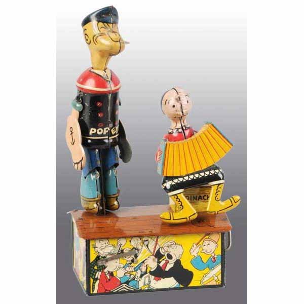 Tin Litho Marx Popeye & Olive Oyl Roof Jigger Toy: American. Working. Nice lithography scenes of Popeye characters on base. Original arms and pipe on Popeye while Olive Oyl is missing her wire hair bun. Some minor wear throughout. 9" T.