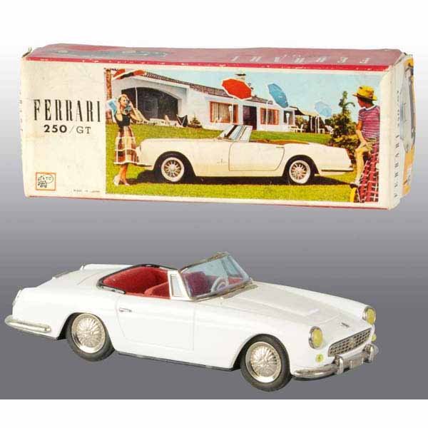 Tin ATC Ferrari 250 GT Car Friction Toy.: Japanese. Circa 1957. Made by Asahi Toy Company. Working. Flocked seats with beautiful original hubcaps. "GT250" on license plate in rear. Very little wear overall with just some slight spidering to l
