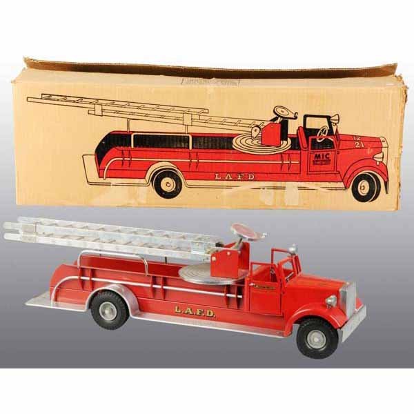 Pressed Steel Smith Miller Fire Ladder Truck Toy.: Includes original box. Unused. Nice decals and opening doors. Headlights on front. All original. Beautiful colored pictures of truck on both sides of box. No. 537 Aerial Ladder Fire Truck on rear of b