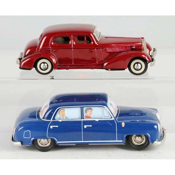 Lot of 2: Tin Mercedes Automobile Toys.: Description German and Japanese. One friction and one wind-up. Blue car with nice lithography. Condition (Near Mint). Size Largest: 8" L.