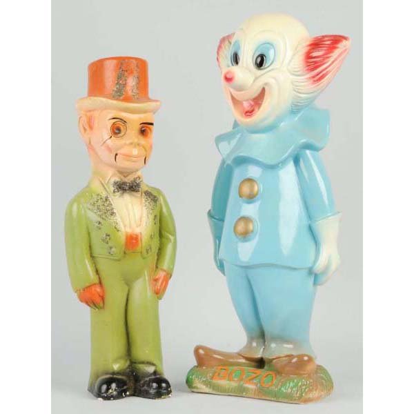 Lot of 2: Plaster Carnival Character Figurines.: Description Includes one Bozo the Clown bank and one Charlie McCarthy carnival statue. Condition (Excellent - Near Mint). Size Largest: 18 - 1/2" T.