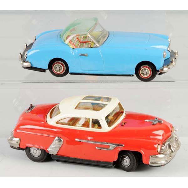 Lot of 2: Tin Automobile Toys.: Description Japanese. Working. Includes one friction Kaiser and one battery-operated Buick with repainted battery box lid. Condition (Very Good). Size Largest: 8 - 1/2" L.