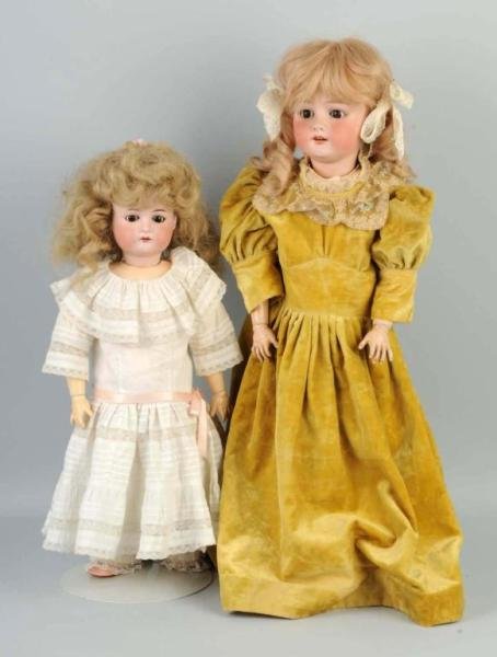 Lot of 2: German Bisque Girl Dolls.: One incised 1912 by Cuno & Otto Dressel (cheek rubs), sleeping eyes, replaced wig, jointed composition body (repainted); one incised 250 Heubach Koppelsdorf, sleeping eyes, replaced wig, jointed compo