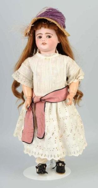 French SFBJ Walking Crying Child Doll.: Fully incised, flirty eyes with real eyelashes, open mouth with teeth, extra long human hair wig, French walking, crying, kiss throwing body (arms stringing is loose so she does not now throw kisses).