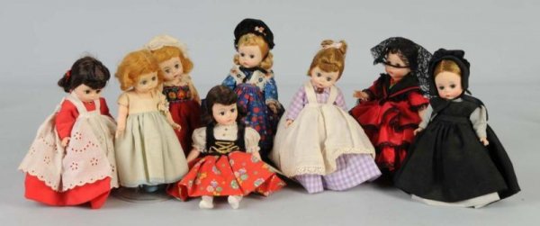 Lot of 8: Madame Alexander Dolls.: Bent-knee dolls are all original and include rare Amish Girl, Spanish, Meg, Jo, Germany, and Wendy with replaced dress. Swedish with straight legs (replaced shoes, dirty dress); Sound of Music Brigitt