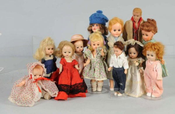Lot of 12: Plastic & Vinyl Dolls.: Ken; Uneeda lady; 2 Ginny dolls with original clothes; 4 Ginny-types, including several Muffys, most with original clothes, hard plastic baby with original clothes, 2 hard plastic girls, and 1 boy in