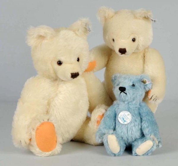 Lot of 3: Steiff Mohair Bears.: 2 white original teddy bears with limited edition white ear tags with button 0203/36 and 41. Blue teddy with white ear tag 665059. All are jointed at neck, shoulders, and hips. Size: Largest: 14 - 1/2