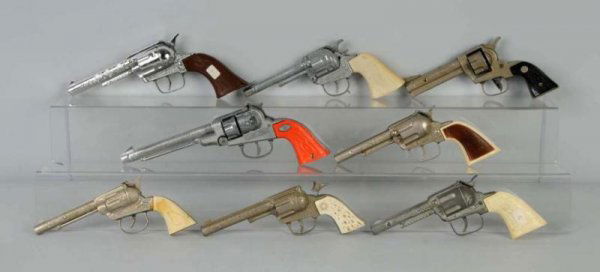 Lot of 8: Assorted Cap Gun Toys.: Size: Largest: 11" L.
