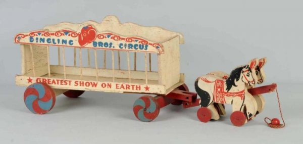 Wooden Horse-Drawn Circus Wagon Toy.: Original ball and pull string. Nice label on back of cart reading "Toy Kraft Inc.". Toy is a knockoff of the Ringling Brothers Circus. Some paint loss and wear, especially to top. Size: 29 - 1/2" L.