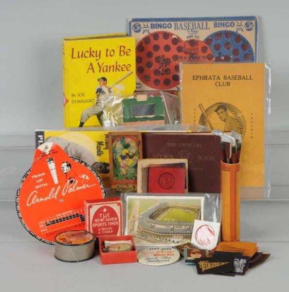 Large Lot of Sports Memorabilia.: Includes Ted Williams bait casting reel, Joe Dimaggio book, 1960s White Sox button, golf bag pencil set, and other items. Size: Largest: 11 - 1/2" L.