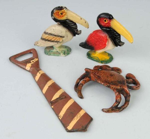 Lot of 4: Cast Iron Assorted Bottle Openers.: Includes two Pelicans by Wilton Products, one Crab by John Wright, and one Neck Tie. Size: Largest: 8 - 1/4" L.