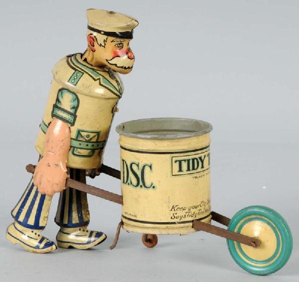 Tin Marx Tidy Tim Wind-Up Toy.: American. Working. Marked "Tidy Tim" on front and "Louis Marx" on back. Missing tools and moderate wear throughout. Size: 8" L.