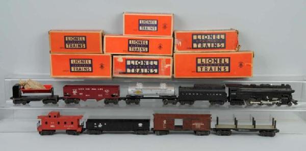 Lionel No. 2055 Freight Train Set.: Includes no. 2055 Steam Engine and Tender, Automobile Boxcar, NYC Gondola, no. 3559 Dump Car, Sunoco Tank Car, and no. 6257 Caboose. Set comes with one handmade wooden train car. Includes all individu