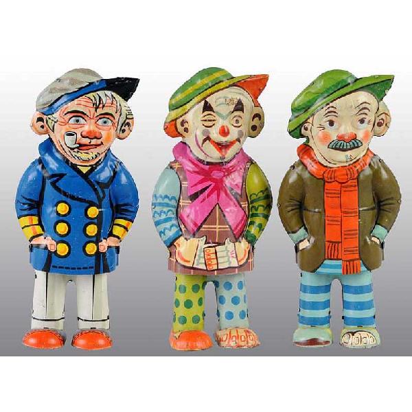 Lot of 3: Tin Litho Walker Wind-Up Toys.: German. Circa 1930s. Working. Includes one Hobo, one Sailor, and one Clown. Very nice lithography. Size: Each: 6 - 3/4" T.