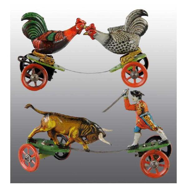 Lot of 2: Tin Litho Fighting Wind-Up Toys.: German. Circa 1920s. Working. One with bull and matador with original sword and cape and one with a pair of roosters. Both are on platforms and when wound they simulate a fighting action. Size: Each: 