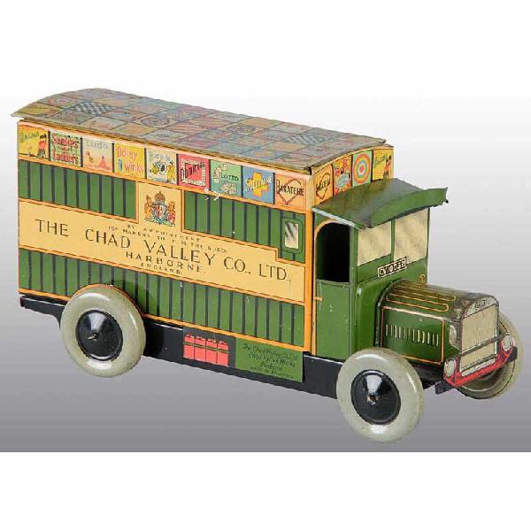 Chad Valley Double Decker Bus Wind-Up Biscuit Tin: English. Marked "Dennis" on front grille. Very nice lithography with advertising around entire tin. Some minor to moderate scratching throughout and some oxidation to bare metal parts of front grille.
