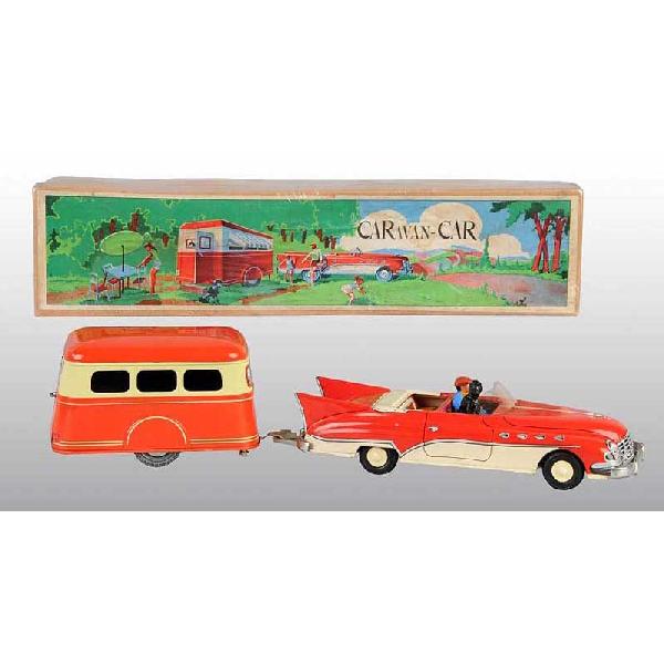 Tin Joustra Car & Trailer Set Friction Toy.: French. Working. Very scarce toy with composition driver and poodle in front seat. Two pieces of tin litho luggage in rear seat. Opening rear doors. Very little overall wear. Includes original box wit