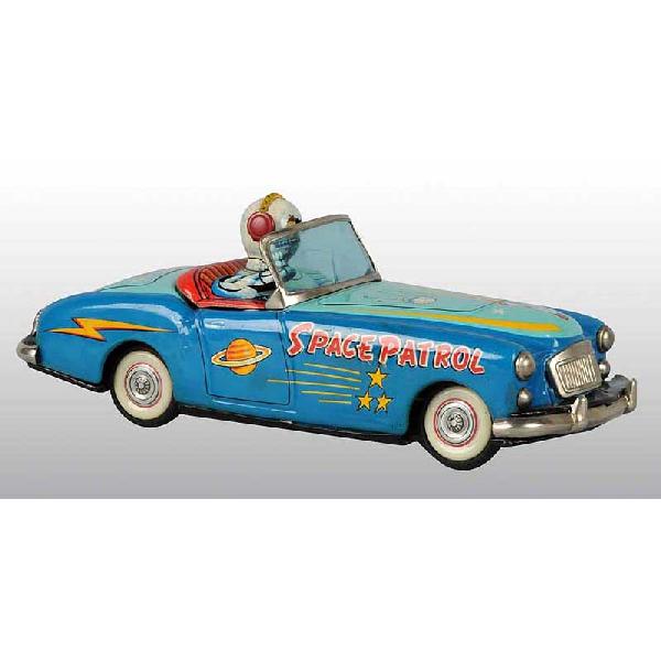Tin Space Patrol Car Friction Toy.: Japanese. Working. Scarce toy. Marked "Space Patrol X-5". Includes tin astronaut driver holding space gun in right hand. Very nice lithography of rockets and planets around toy. Very little overall we