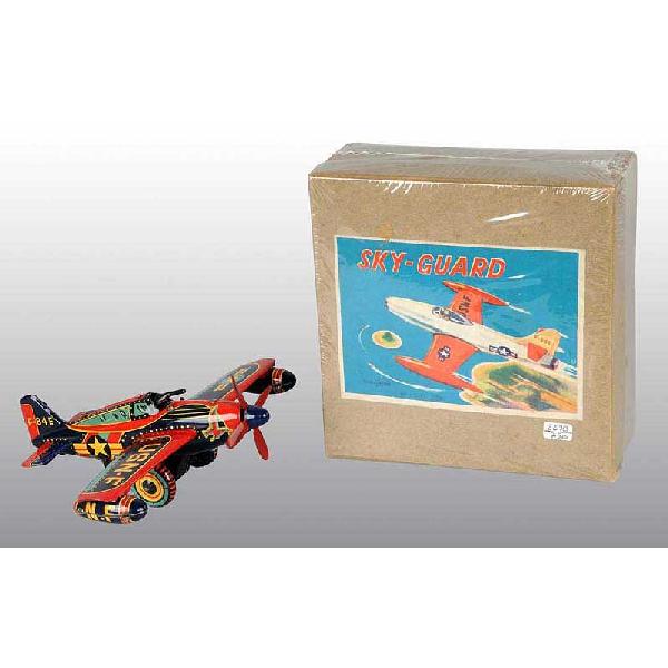 Tin Night Fighter Airplane Wind-Up Toy.: Japanese. Working. Made by Showa. Hard-to-find plane with beautiful lithography and tin bombs on end. Very little overall wear. Includes original box with very nice colorful paper label. Size: 7 - 1/2