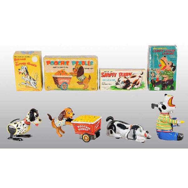 Lot of 4: Tin Dog Wind-Up Toys.: Japanese. Working. Includes Candy Loving Canine, Sniffy Puppy, Herman the Hopping Hound, and the Poochie Peddler. Includes all original boxes. Size: Largest: 6 - 3/4" L.