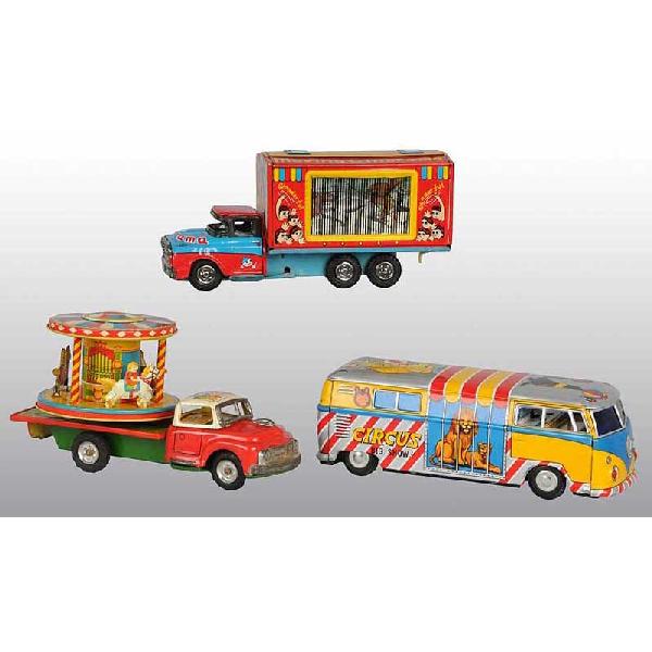 Lot of 3: Tin Circus-Type Truck Friction Toys.: Japanese. Working. Includes one Volkswagen Circus Big Show Bus with lithographed animals on all sides, one Moving Cinerama Truck with cowboy and Indian scenes flashing on side when crank is wound, and