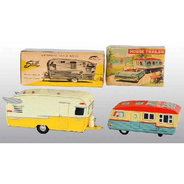 Lot of 2: Tin Litho Trailer Pull Toys.: Japanese. One is a Fleetline Shasta Travel Trailer and the other a House Trailer with nicely lithographed people in windows. Very little overall wear. Includes both original boxes. Size: Largest: 11"