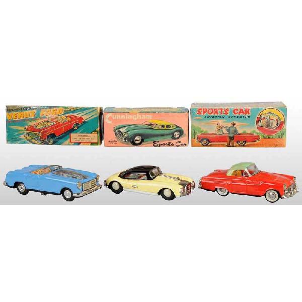 Lot of 3: Tin Sports Car Friction Toys.: Japanese. Working. Includes one Asahi Toy Cunningham, one TN Venus Ford with visible front engine, and one TN Thunderbird with clear plastic removable hardtop. Some slight oxidation to chrome. Include