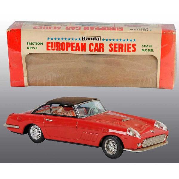 Tin Ferrari Super America Friction Toy.: Japanese. Working. Minor wear to roof. Includes original window box with some fading and creasing. Size: 11" L.