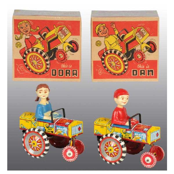 Lot of 2: Tin Marx Dan & Dora Auto Wind-Up Toys.: American. Working. Figures are plastic. Heads bob on springs. Both marked with funny sayings on all sides of cars. Slight scratching and wear. Includes both original and crisp boxes. Each: 5 - 1/2" L.