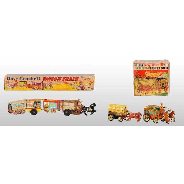 Lot of 2: Tin Marx Davy Crockett Horse-Drawn Toys: American. Includes wind-up wagon train and one friction stage coach with frontier wagon. Includes both original boxes with nice colorful lithography and some creasing throughout. 14 - 1/2" L.