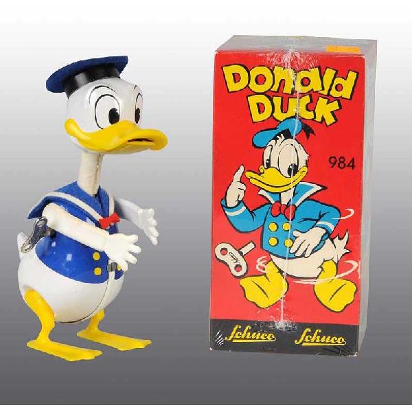 Schuco Disney Donald Duck Wind-Up Toy.: German. Working. Plastic with felt hat. Little to no wear. Includes original box marked "984". 6" T.
