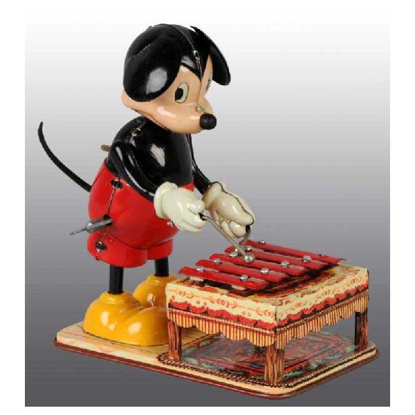 Tin Linemar Disney Mickey Xylophone Wind-Up Toy.: Japanese. Working. Marked "Walt Disney Productions" on back of toy. Original ears, nose, and tail. Keys are nearly perfect with almost no wear throughout entire toy. 6 - 1/2" T.
