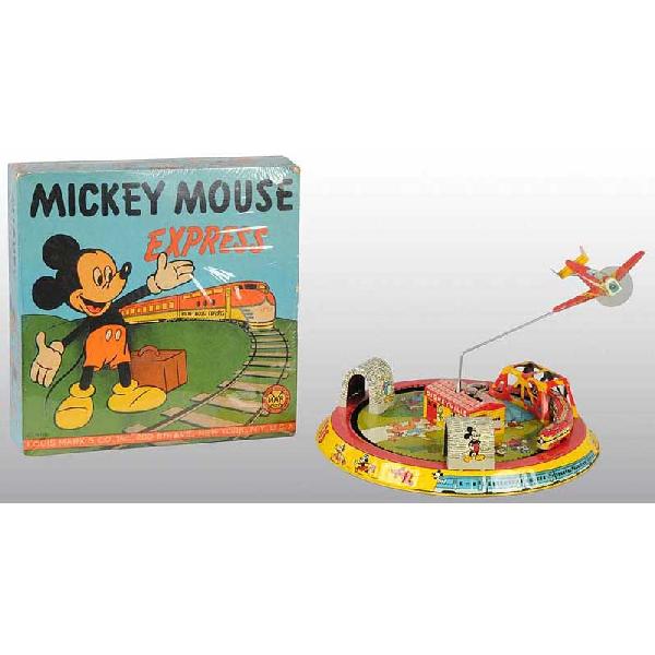 Tin Marx Disney Mickey Mouse Express Wind-Up Toy.: American. Working. Original airplane and plastic prop. This version does not have plastic Mickey figure in airplane. Nice colorful scenes of Disney characters around base. When wound, train and airpla