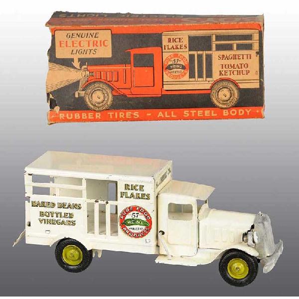Pressed Steel Metalcraft Heinz Pickle Truck.: American. Original spare tire, spare tire hook, and back tailgate. Some minor paint chipping and wear. Includes partial box with a few inner flaps detached but present and one side with missing flaps.