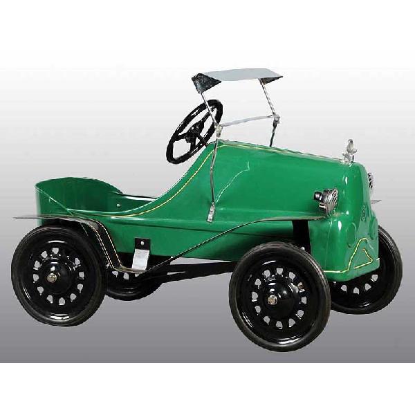 Pressed Steel 1950 Model T Ford Pedal Car.: Made by Garton Toy Factory in Sheboygan, WI. Restored with chrome trim. All steel and original body. 33" L.