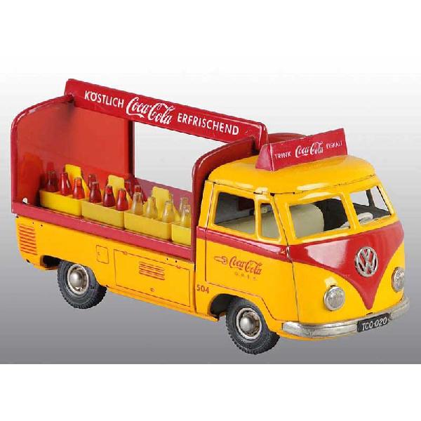 Tin Coca-Cola Volkswagen Truck Friction Toy.: German. Working. Made by Tippco. Marked "Coca-Cola G.M.P.H." on doors, "KOSTLICH Coca-Cola", "ERFRISCHEND" and "TRINK" throughout the truck. Includes three original cases and plastic bottles. Rare tru