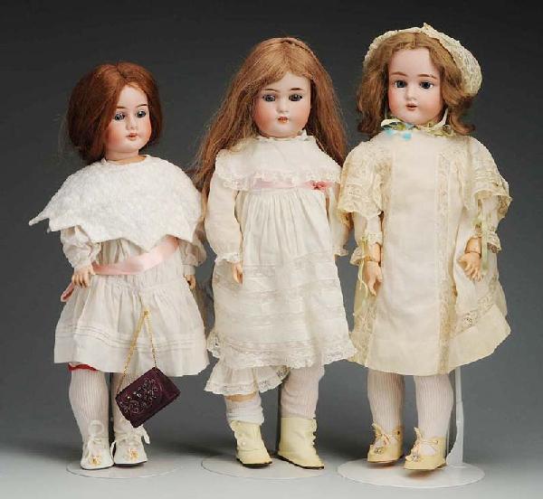 Lot of 3: German Bisque Dolls.: Pansy, sleep eyes, jointed composition body; 1904 A & M Made in Austria, sleeping eyes, joined composition body; Simon & Halbig G.B., glass eyes, jointed composition body. Size: Largest: 23" T.