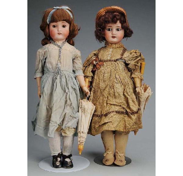 Lot of 2: German Bisque Child Dolls.: Schoenau Hoffmeister 1909 (large chunk broken from back crown rim), sleeping eyes, open mouth, wig disintegrating, jointed composition and wood body; Bruno Schmidt BSW in heart, sleeping eyes, open mo