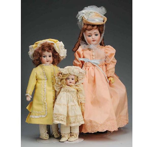 Lot of 3: German Bisque Child Dolls.: A.M. 370 shoulder head, sleeping eyes, new kid body with bisque hands; Kestner 168, sleeping eyes, open mouth with molded upper teeth, jointed composition Kestner body (needs restringing); A.M. 390, n