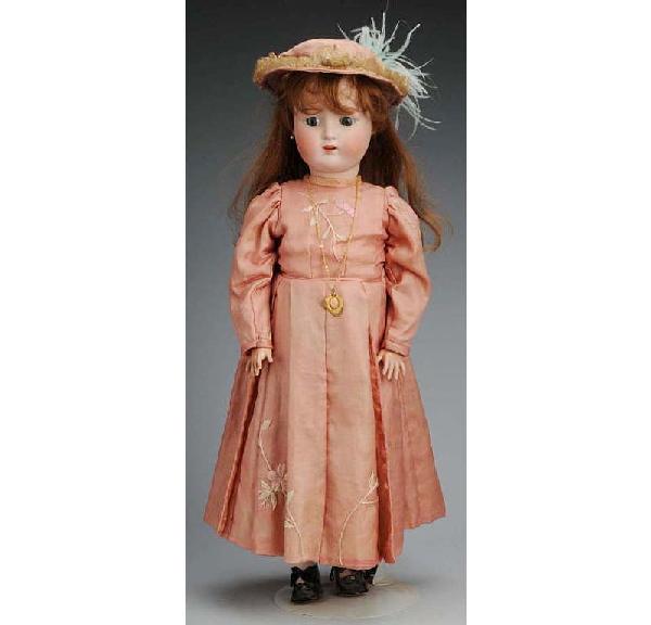 Alt, Beck & Gottschalk German Bisque Child Doll.: Mold 1362 Sweet Nell, blue sleeping eyes, molded eyebrows, open mouth, pierced ears (one chipped), jointed composition body, rose silk dress and hat. Size: 30" T.
